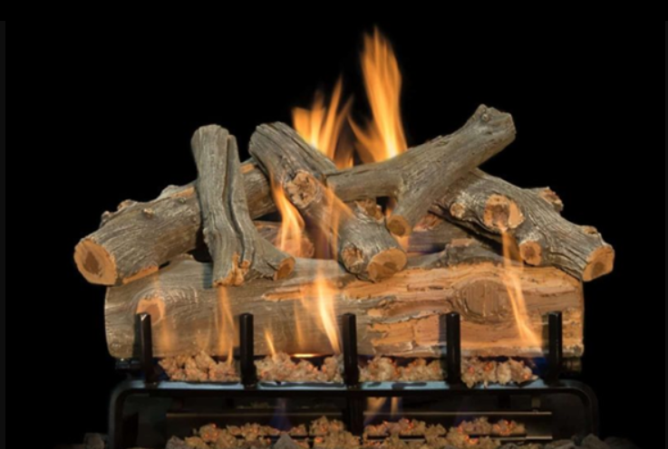Wooden logs burning in a fireplace with flames against a black background
