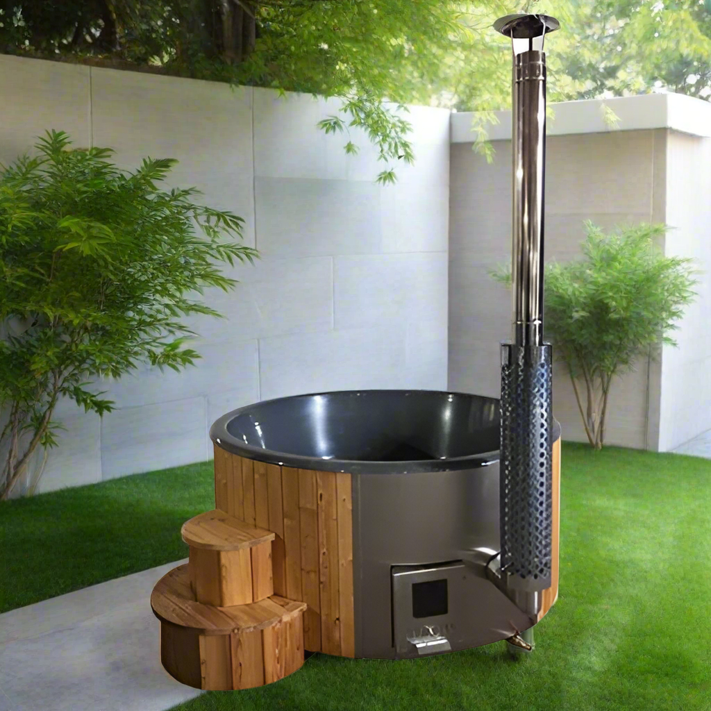 Outdoor hot tub with wooden steps and metal chimney in a garden setting