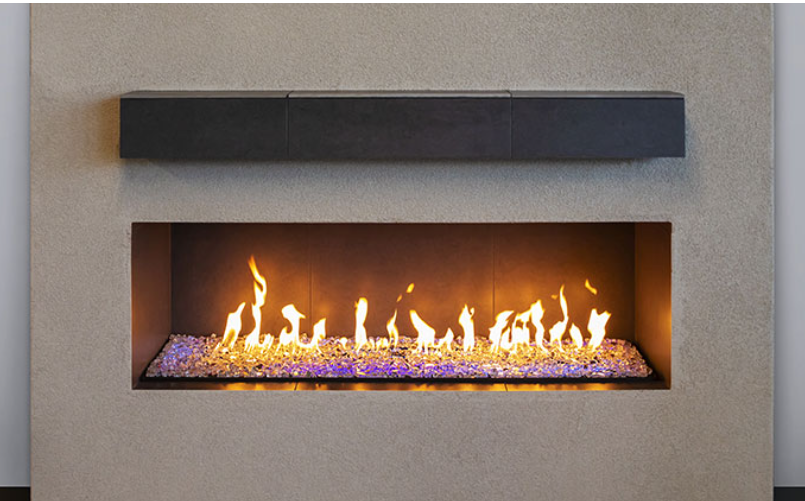 Grand Canyon Gas Logs Bedrock Vented Contemporary Linear Drop-In Burner, 24” to 96” in a fireplace.
