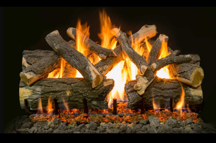 Wooden logs burning in a fireplace with flames against a black background