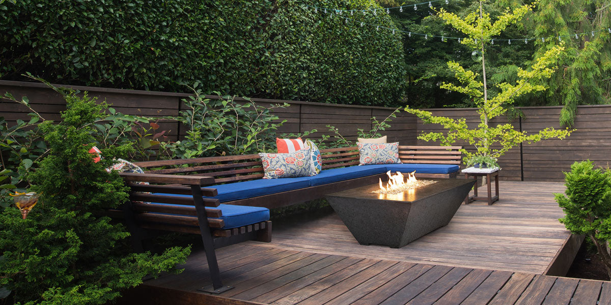 black fire table in a garden